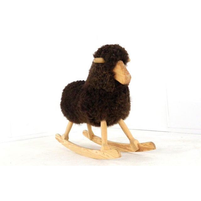 A Timeless Piece of Danish Craftsmanship: The Povl Kjer Rocking Sheep Sometimes you come across an object that perfectly...