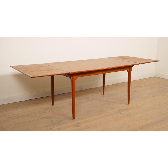This multifunctional vintage dining table was designed by Omann Jun (model 50) and is incredibly practical: without the...