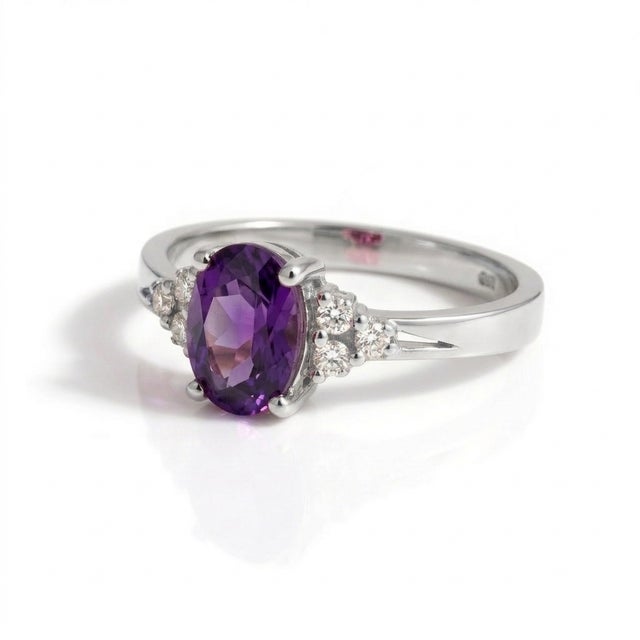 This elegant ring features a captivating Amethyst gemstone, celebrated for its rich violet hue and timeless...