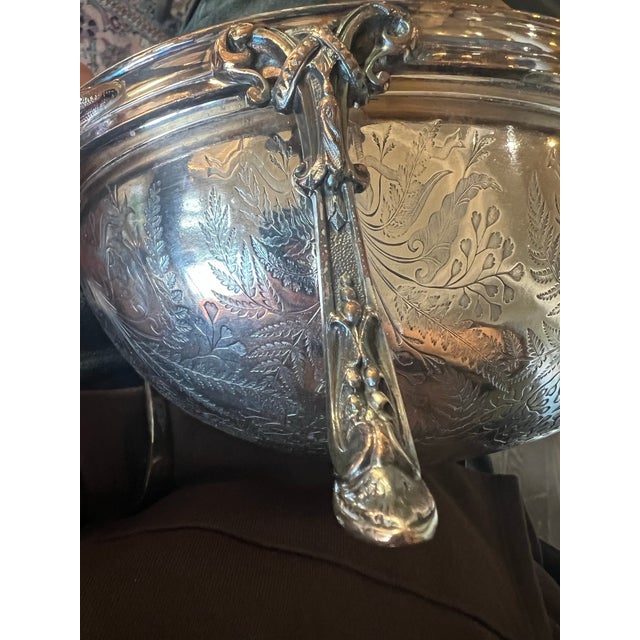 Gorgeous etching on this antique domed server which stands on fabulous long legs with carving. Rare Bakelite knob in a...