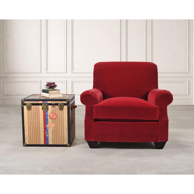 An elegant "London" lounge or club chair in stunning Italian red riding velvet designed by Ralph Lauren. The tailored and...