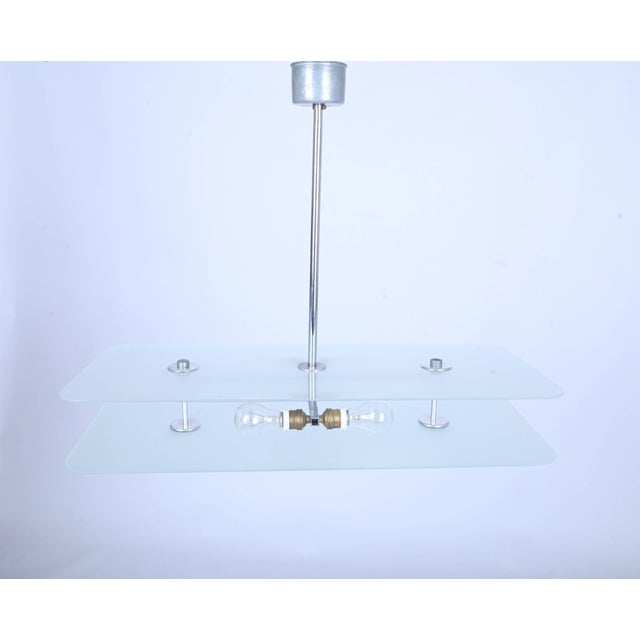 Bauhaus Chrome and Glass Ceiling Light, 1930s, in Very Good conditions. Designed 1920 to 1949 European Plug (up to...