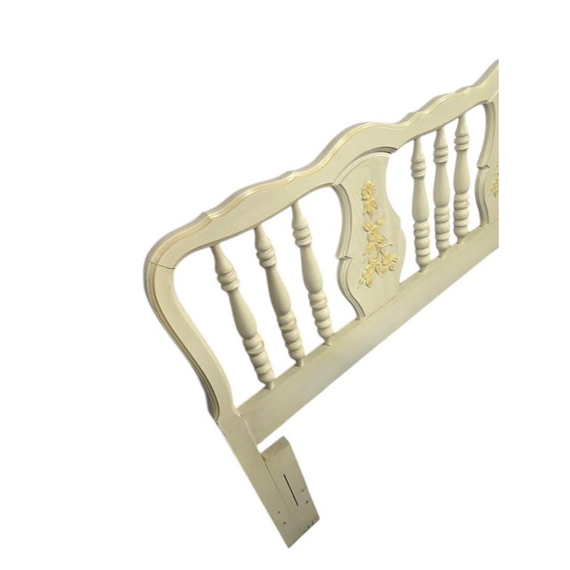 Charming vintage full/queen size wooden headboard featuring turned spindle posts and carved floral appliqué panels....