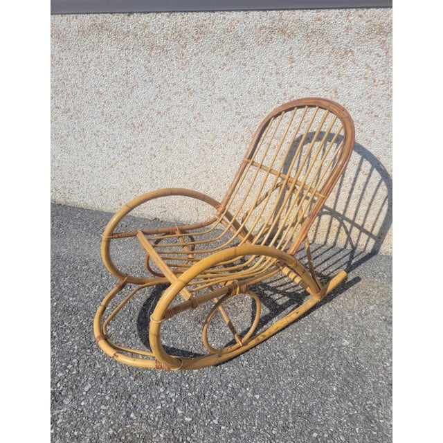 Splendid 1960s-style bamboo armchair. Excellent overall condition. Dimensions: Height: 91 cm Depth: 110 cm Length: 60 cm...