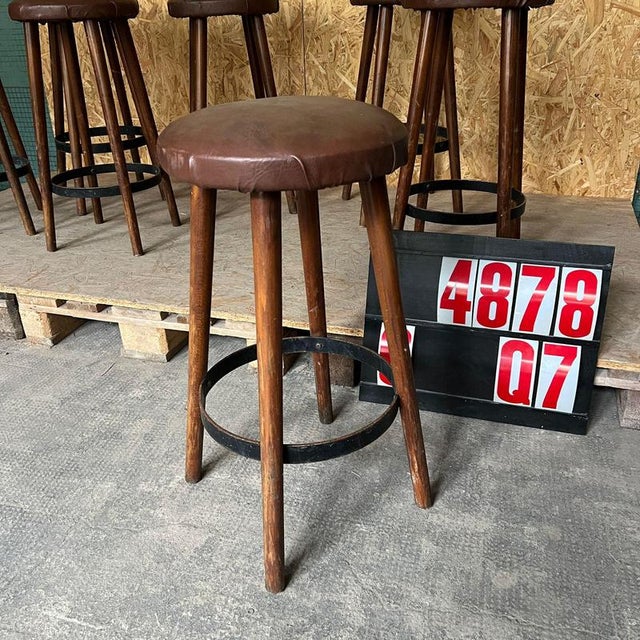 1960’s Original French Barstools – Set Of Seven. Good quality classic bar stools in a rich mid oak colour. They have a...