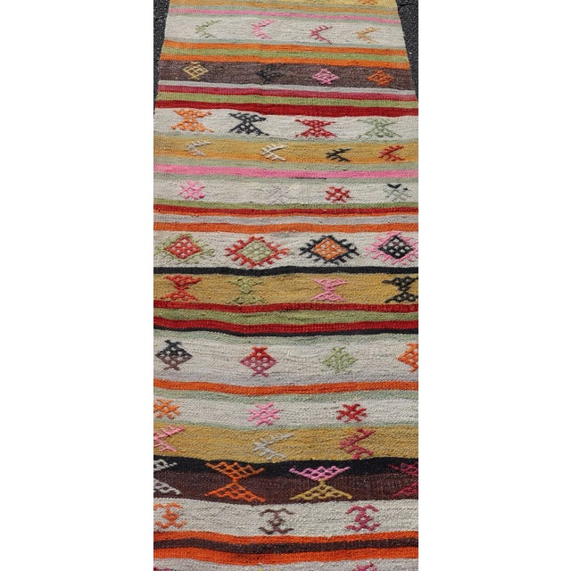 Tribal Mid 20th Century Vintage Hand Woven Turkish Kilim Colorful Stripe Runner With Tribal Motifs For Sale - Image 3 of 12