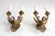 Beautiful pair of antique brass wall sconces with detailed eagle motifs and outstretched wings. The elegant scroll arms...