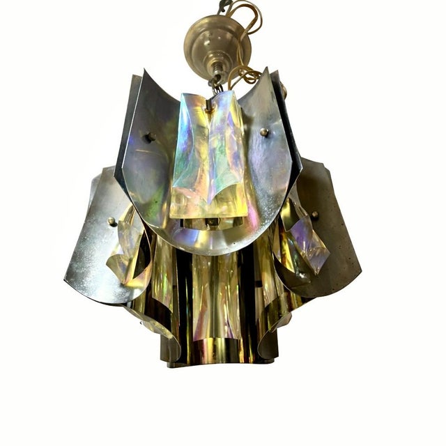This exceptional pendant lamp made of Murano glass embodies the iconic design language of the Space Age from the mid-20th...