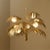 The Palm Chandelier brings tropical elegance into any space with its intricately hand-molded palm leaf silhouette, casting...
