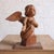 A striking 19th Century Belgian Carved Oak Cherub Statue, hand-carved with expressive detail and a warm, richly aged oak...