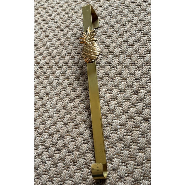 Pretty pineapple wreath hook for over the door. Please see condition details noted. Most items found at Pub & Oasis are...