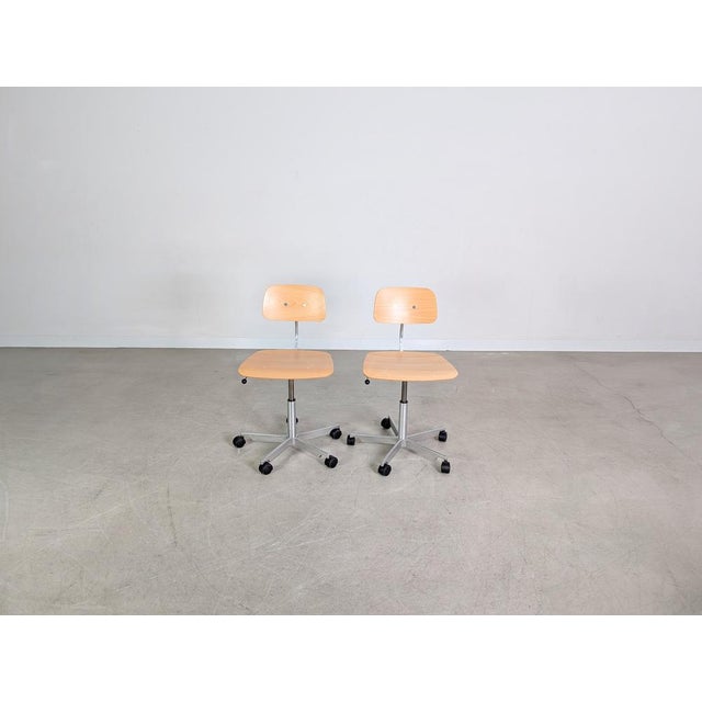 Two beautiful wooden office chairs from the renowned Danish manufacturer Fritz Hansen for sale. Designed by Jørgen...