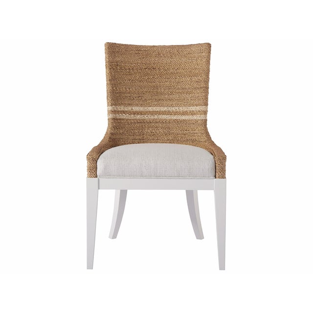 A gorgeous fusion of texture and tone, the Siesta Key Dining Chair is crafted with a natural woven abaca back, a cozy...