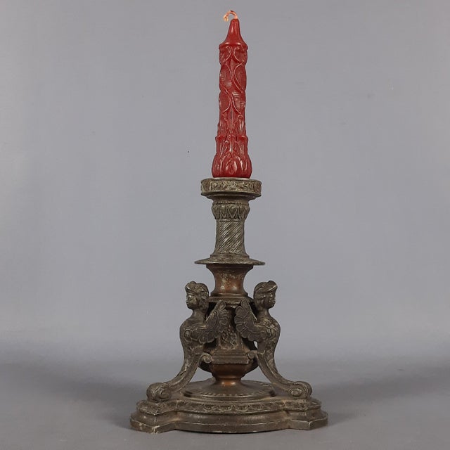 Up for sale is a valuable 19th-century antique (late 19th century): a table candlestick crafted from burnished antimony...