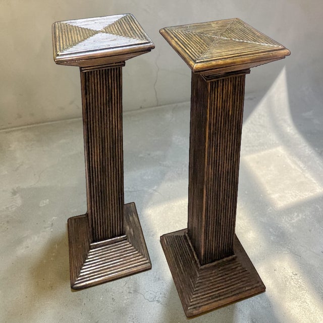 A pair of MCM Pencil Reed pedestals are stylish and sturdy indoor decor piece made of Pencil reed wood rattan. The stand...