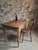 Vintage French writing desk with bistro chair, dating from circa 1930. The table is made from oak with elm legs. It has a...