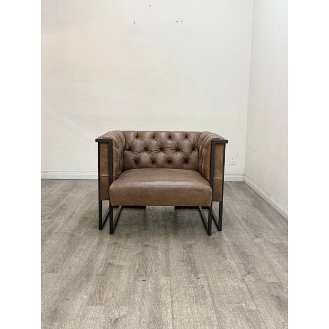 Beautiful pair of modern leather tufted club chairs in good condition
