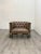 Beautiful pair of modern leather tufted club chairs in good condition