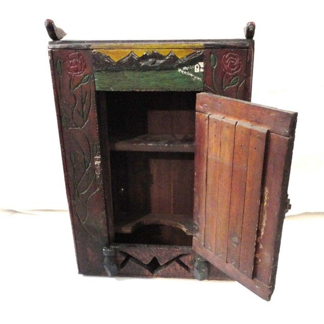 Fantastic all original hand carved and painted 19thc hanging wall cupboard . This folky cupboard was found in the mid west...
