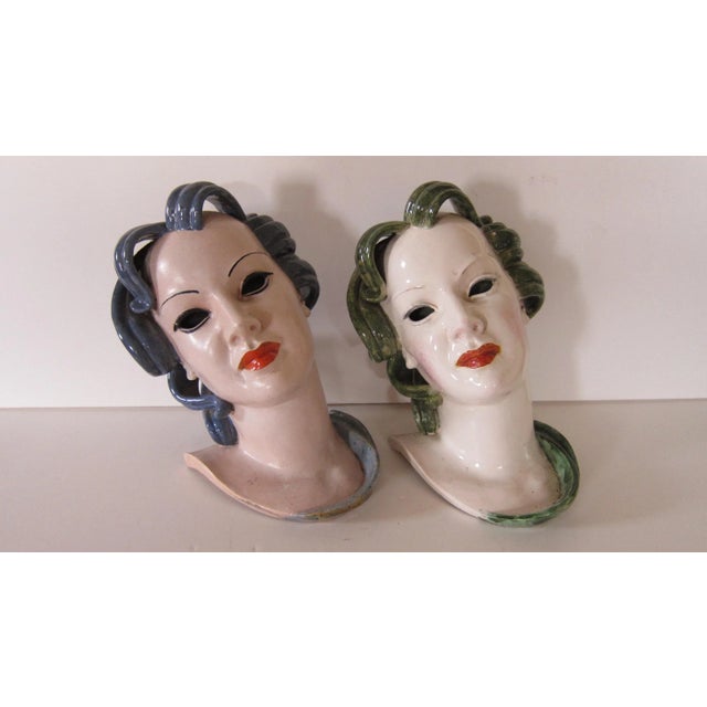 Signed and numbered pair of ladies heads from an Austrian firm that was in manufacture for only four years in the '20s....