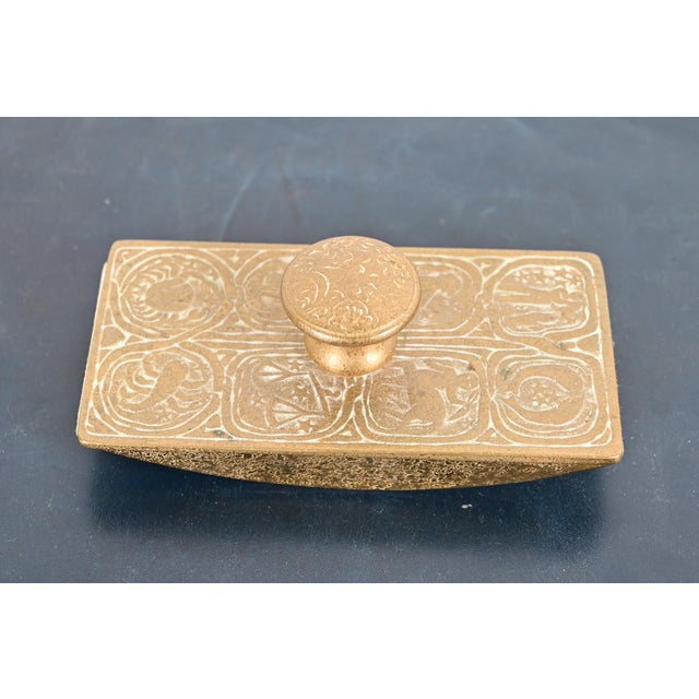 A gorgeous Arts & Crafts or Art Deco period gilt bronze "Zodiac" pattern rocker ink blotter By Tiffany Studios (signed on...