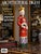 This is a hand-painted porcelain figurine depicting a Qing dynasty emperor dressed in a vibrant red robe with polychrome...