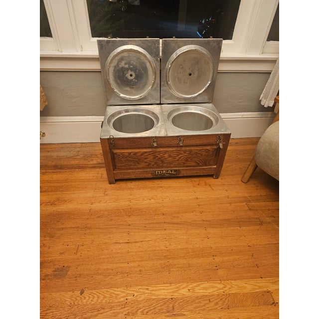 Offered is a beautifully preserved antique double-compartment icebox manufactured by The Toledo Cooker Co., Toledo, Ohio,...