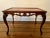 Vintage wood rectangular end table with inlay detail. 26 1/2" long x 16 1/4" wide x 18" tall.