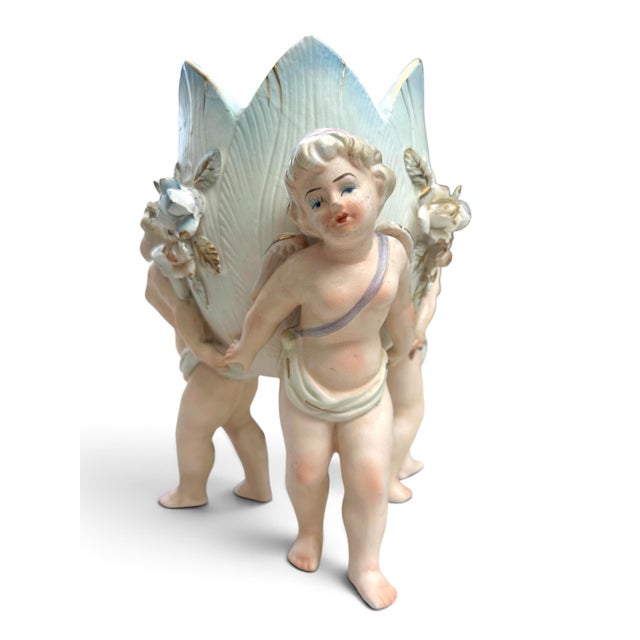 Charming mid-century Lenwile Ardalt Artware porcelain planter featuring three hand-painted winged cherubs surrounding a...