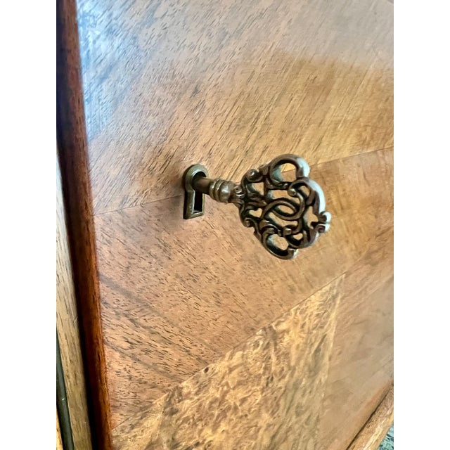 Immerse yourself in the glamorous world of Art Deco with this exquisite sideboard from the 1930s, made in Germany. This...