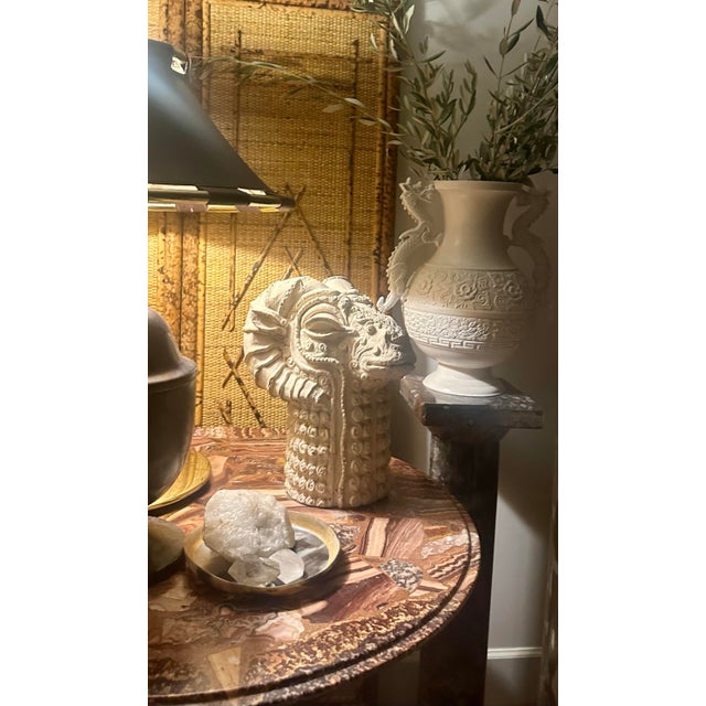 A handsome mid-century style cast-stone Ram's head bust or statue made with great attention to artistic detail. It's...