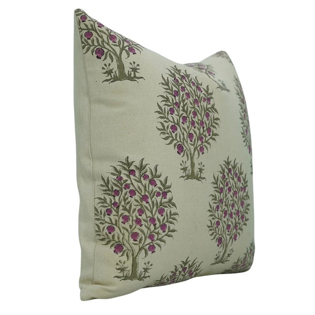 The Anar cushion cover bursts with charm, featuring a hand block printed design inspired by the pomegranate...
