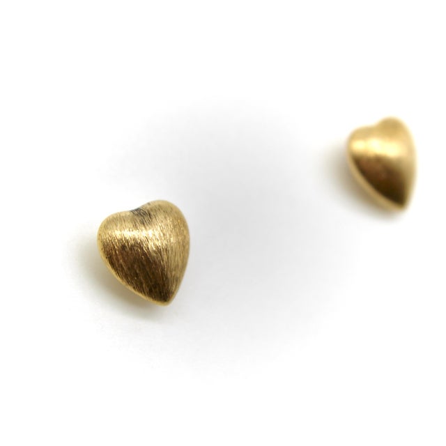 These sweet little puffy heart earrings have a nice dimensionality to them. Both the front and back of the heart is puffy,...