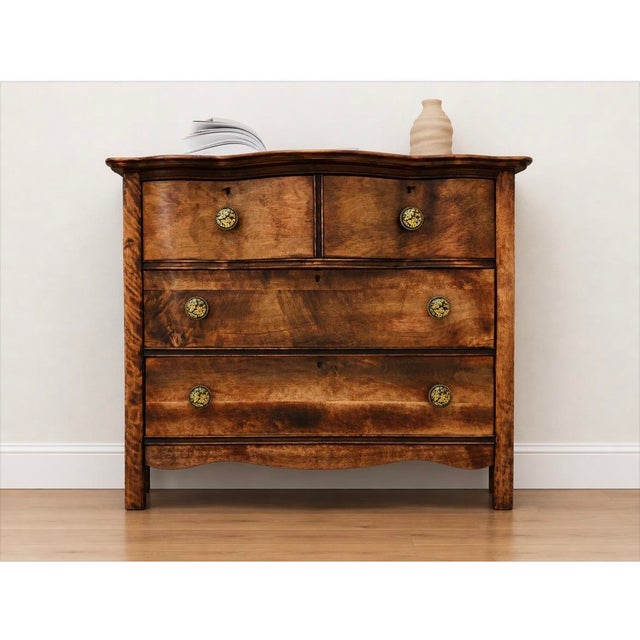 A stunning refinished solid wood Vintage Serpentine Chest of Drawers. The top displays a warm Rubio Monocoat walnut wood...