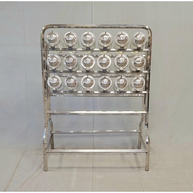 A stunning and functional antique eighteen canister candy store display (Caramelera) made by Vendosolo (Vendo Solo) in...