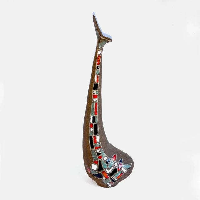 This terracotta vase-shaped sculpture is irregular, with abstract decoration with enamels. It is signed Roberto Rigon R.R.