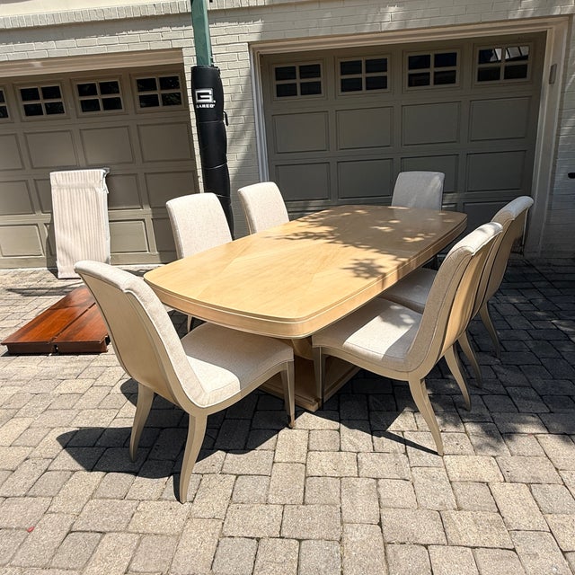 Caracole Fan Expanding Dining Table with Set of 8 Side Chairs The shape of this table is an homage to Art Deco. The curved...