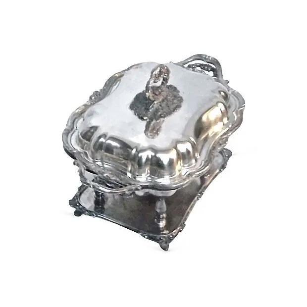An antique 19th century silverplated chafing dish with separate inset tray and lid. It features a lovely scalloped design...