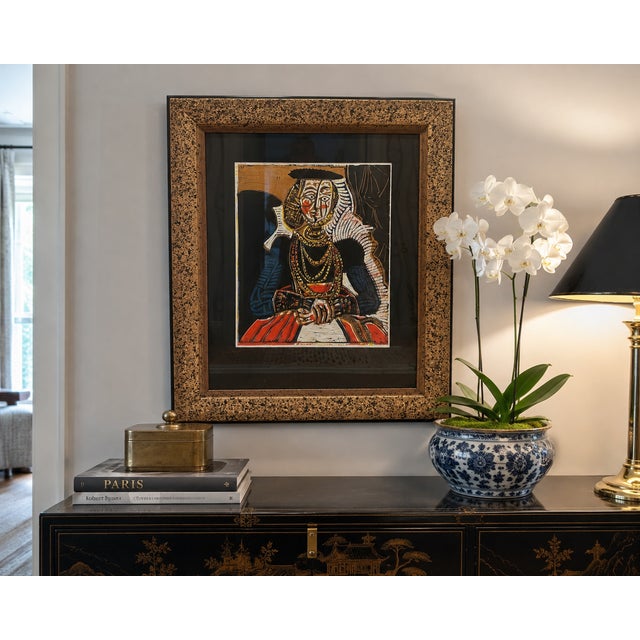 A striking late 20th-century color lithograph depicting a regal female figure rendered in a bold Cubist-inspired style....