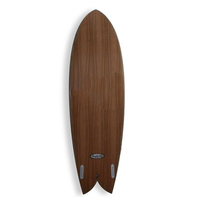 Sexy Cowgirl is a 6'4" Rockin Fig Epoxy Wood Veneer Rideable Surfboard. Crafted or branded via Rick Fignetti, a legendary...