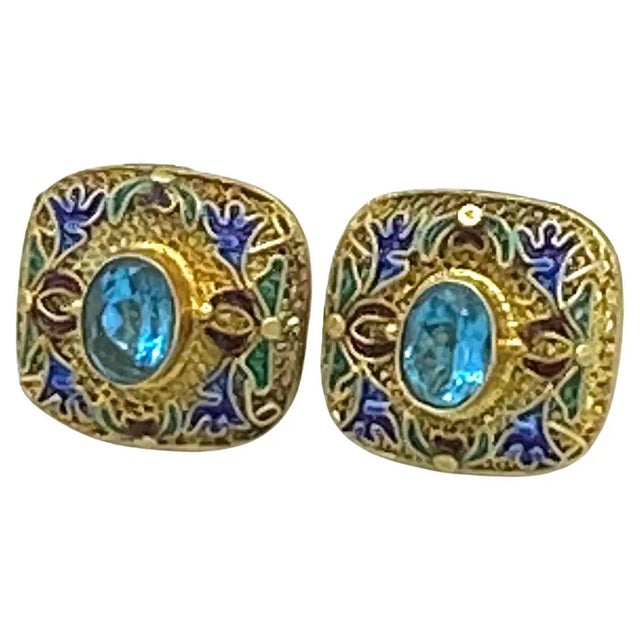 This is a pair of 24K vermeil cloisonne with blue topaz earrings. These modern small square post earrings are cloisonné...