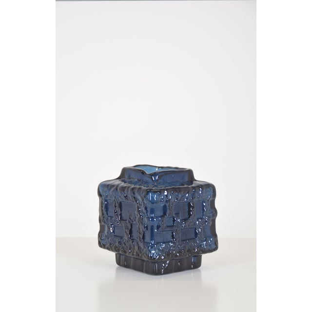 Swedish vase model Cobolt designed by Göte Augustsson in the 1960s. It was manufactured in thick, blue-tinted glass by...