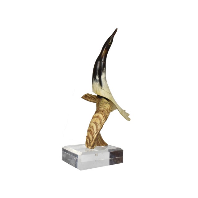 Stunning RARE artistic art deco sculpture is comprised of carved cow horn attached on a ram horn mounted to a square...