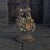 This antique 1920s cast iron flower basket doorstop is marked and numbered, making it a unique and collectible piece....