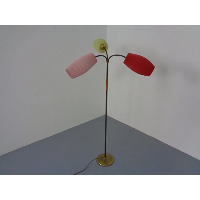 Floor lamp with 3 lampshades. Each lamp can be switched individually. European Plug (up to 250V).The wiring of this item...