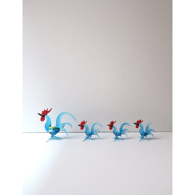 A beautiful handmade art glass rooster family sculpture set (4), circa 1970s. Four Roosters in set. Art glass colors...