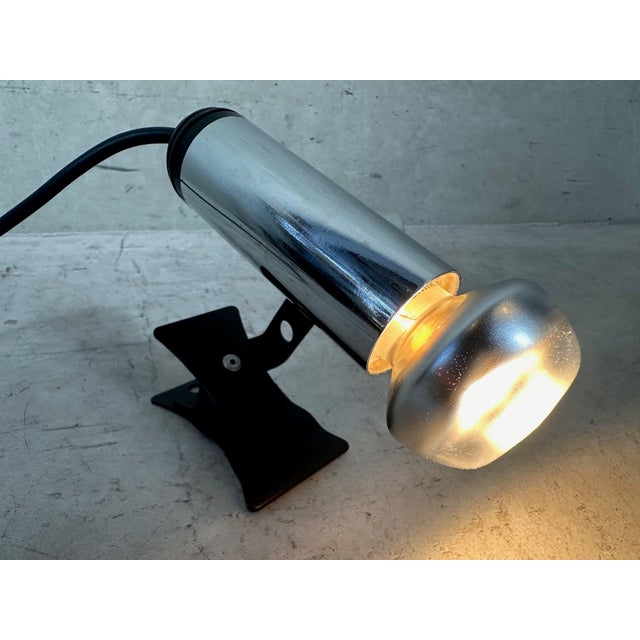 Designer clamp spotlight. Chrome finish. E14 socket. Bulb not included. Rotatable in all directions. Clamp in good working...
