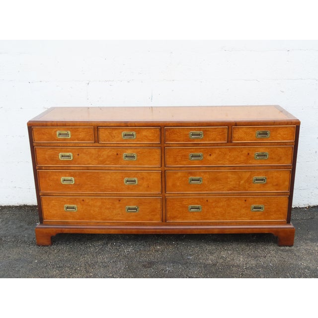 This magnificent Dresser is made of wood, solid wood, burlwood, veneer, and metal. The Dresser was made by Century...