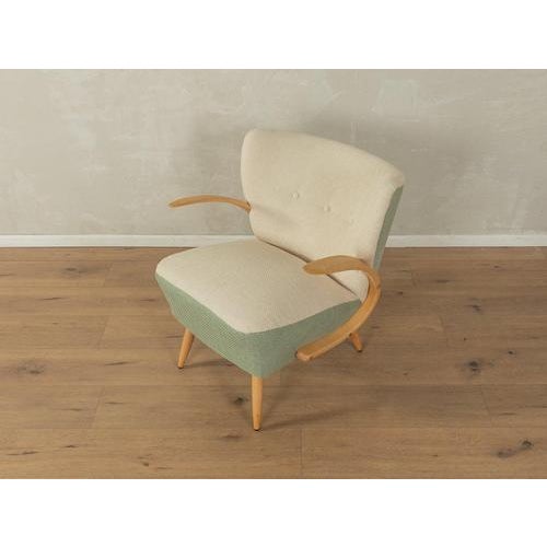 Mid-Century Armchair Very good workmanship High-quality materials Made in Germany Seat Height: 47.0 cm Width: 65 cm...