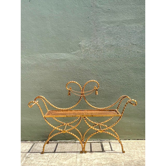 This exquisite Hollywood Regency settee is a masterclass in mid-century glamour, featuring an intricate twisted wrought...